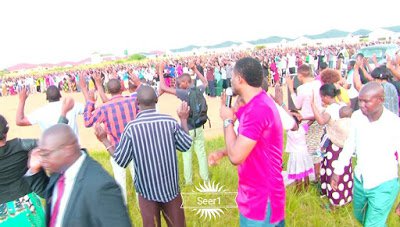 Pastor Comes Under Fire After Allowing His Members To Kiss His Shoes For Miracle (Photos)