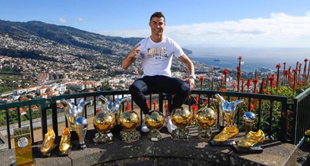 Cristiano Ronaldo Poses With His 15 Individual Trophies