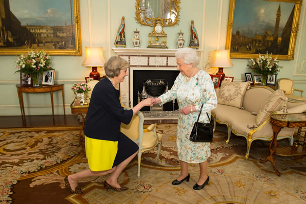 PHOTOS: New UK PM meets, kneels for Queen Elizabeth II
