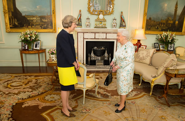 PHOTOS: New UK PM meets, kneels for Queen Elizabeth II