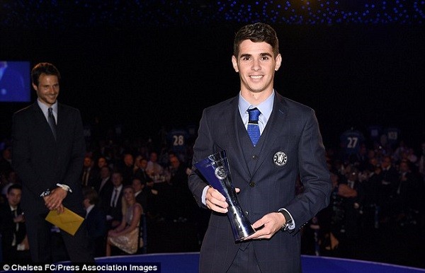 Chelsea's Oscar holds his award after winning Goal of the Season for his strike against QPR