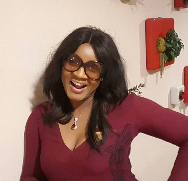 Sweet Mama: Omotola Shows Off Her Curves in Waist Trainer (Photo)
