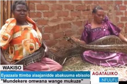 Shocking Story: Ugandan Woman Claims to Have Given Birth to Twins Which One is a Snake (Photos)