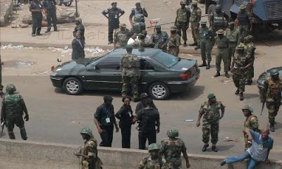 Serious Drama as Policeman Beat the Hell Out of Soldier at ATM Queue in Damaturu