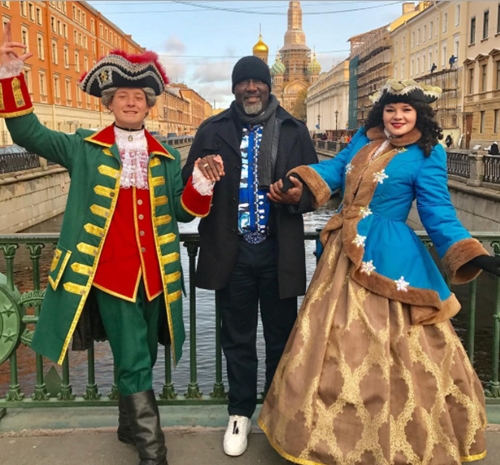 See What Senator Dino Melaye was Spotted Doing with a Pretty White Lady in Russia (Photos)