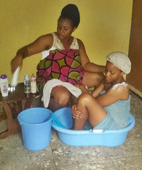 Mother's Love: Mom Bathes, Bottle-feds and Dresses Up Her Adult Daughter on Her Birthday (Photos)