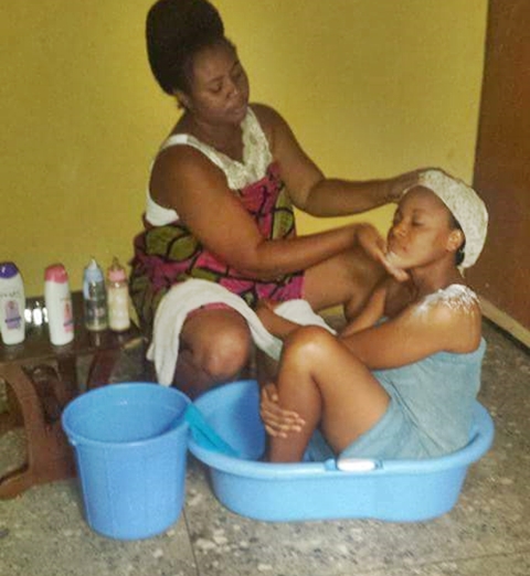 Mother's Love: Mom Bathes, Bottle-feds and Dresses Up Her Adult Daughter on Her Birthday (Photos)