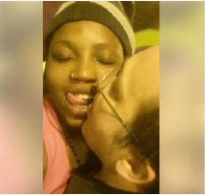 Drama as Nigerian Woman Gets Sensual with White Man in Public (Photos)