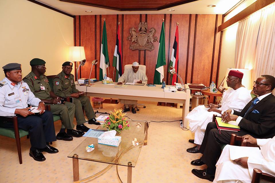 See Photos Of President Buhari Working From Home