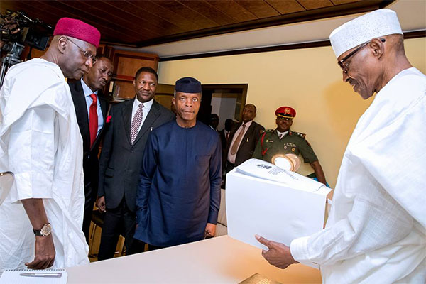 See Photo of Osinbajo Submitting Probe Report on SGF and NIA to President Buhari