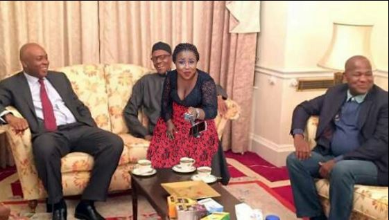 So Hilarious: See 'Photo' of Beautiful Lady Sitting on Buhari's Lap in London