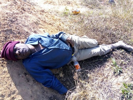 Man Caught Sleeping on Top of a Fresh Grave...You Won't Believe Why (Photos)
