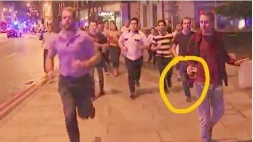 Man Seen Fleeing Scene of London Terrorist Attack with Beer in Hand (Photo)