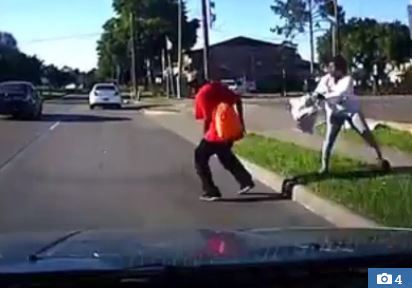 Horror: Lady Tries to Kill Her Own Boyfriend, Pushes Him in Front of Moving Car (Video)