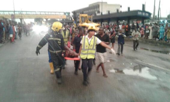 Container Falls On Two Fully Loaded Commercial Buses In Ojota This Morning