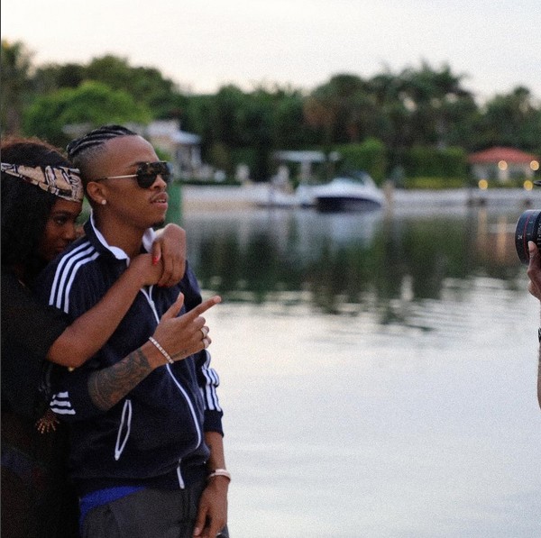 Tekno shoots music video in Miami, cuddles US-Based Model