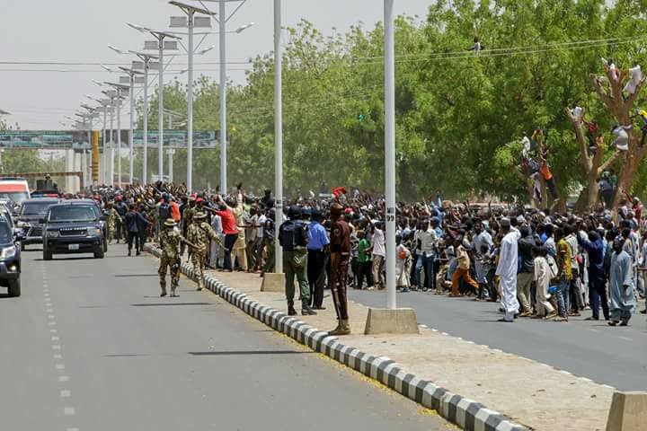 Yobe residents climb trees just to see President Buhari during his sympathy visit. (Photos)