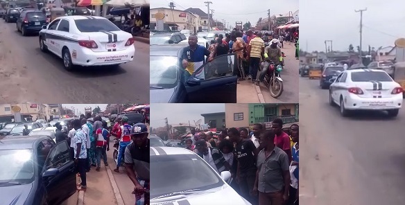 Hilarious moment Nigerians spotted a self-driving car for the first time and mobbed it. (Video)