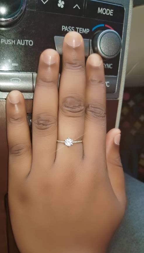 Nigerian man engages his girlfriend with N2 million cheque and diamond ring! (Photos)