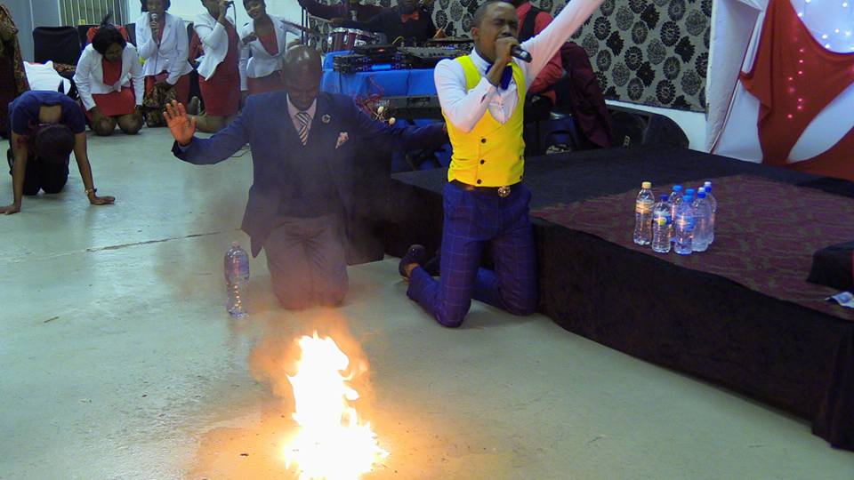 South African Pastor has in members in tears after he turns water to petrol. (Photos)