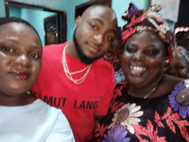 Davido visits roadside eatery in Ibadan, enjoys plate of Amala and Ewedu (Photos)