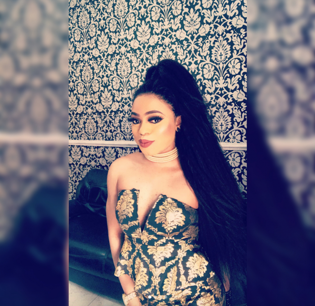 Bobrisky displays cleavage in new photos; fans react.