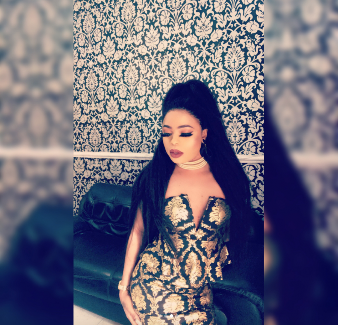 Bobrisky displays cleavage in new photos; fans react.