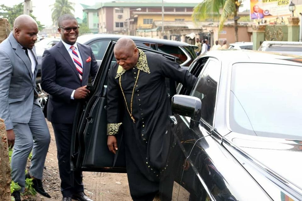 Lagos pastor, Tom Samson, strikes a pose besides his Rolls Royce phantom(photos)