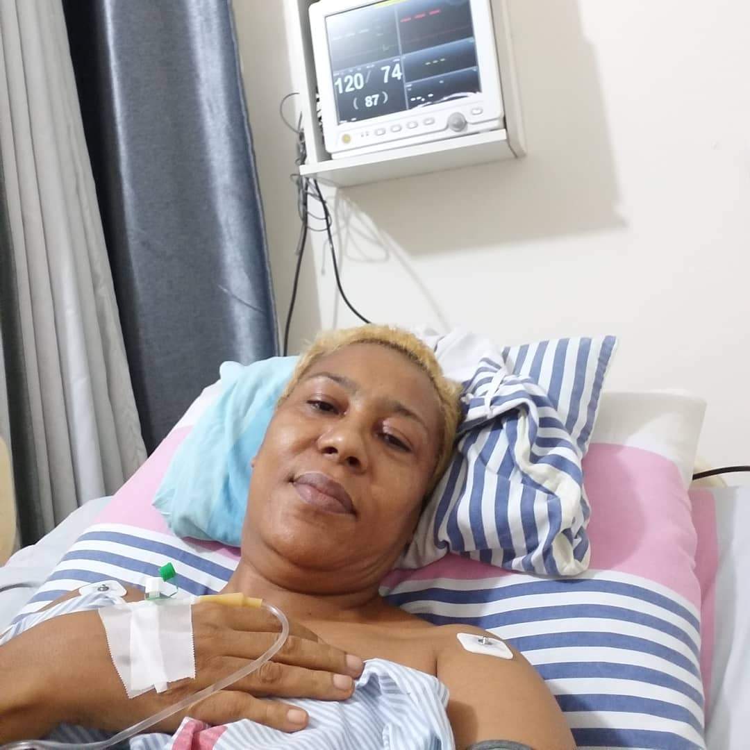 Moment Shan George stepped out for the first time after spine surgery (photos)