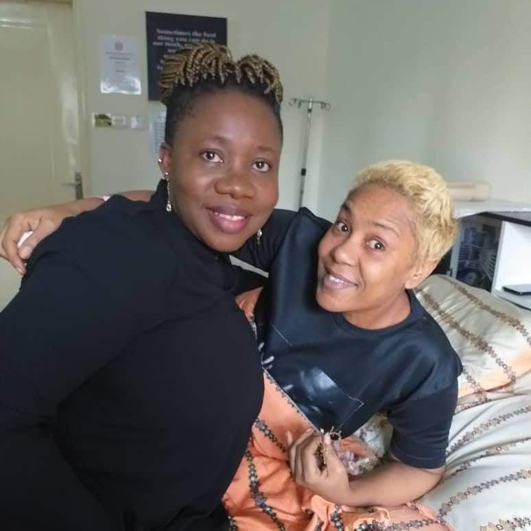 Moment Shan George stepped out for the first time after spine surgery (photos)