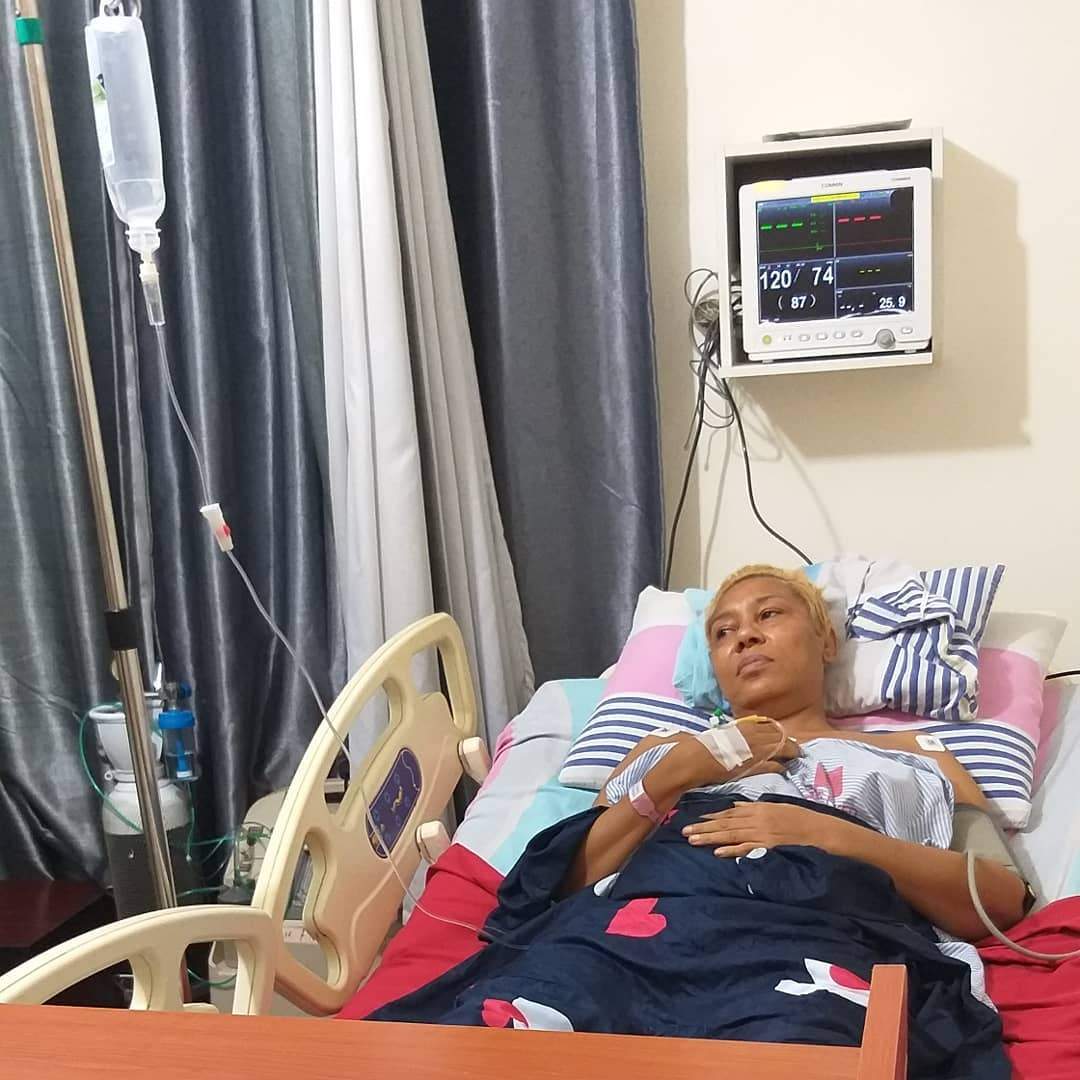 Moment Shan George stepped out for the first time after spine surgery (photos)