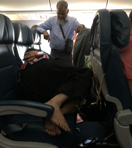 Man stands for 6 hours on flight so his wife can sleep