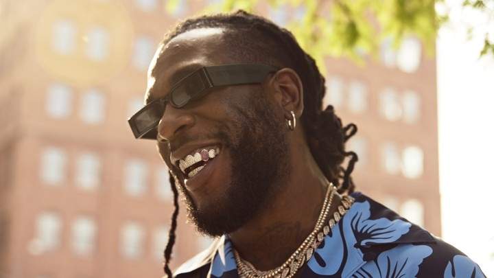 Burna Boy walks a fan out of his show for not vibing to his performance (Video)