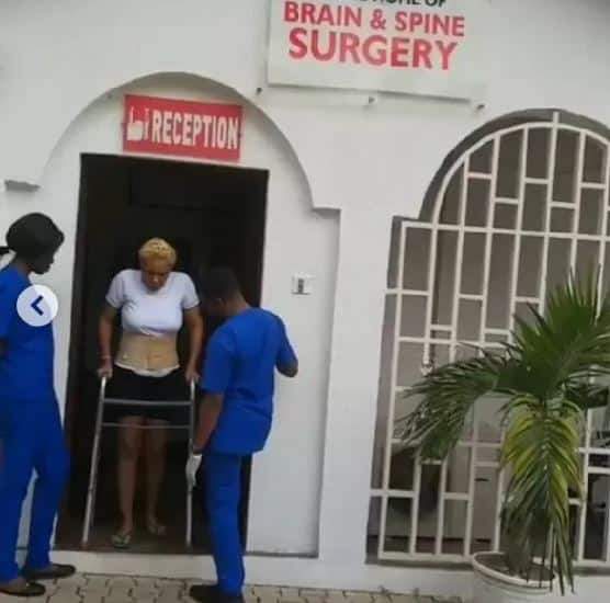 Moment Shan George stepped out for the first time after spine surgery (photos)