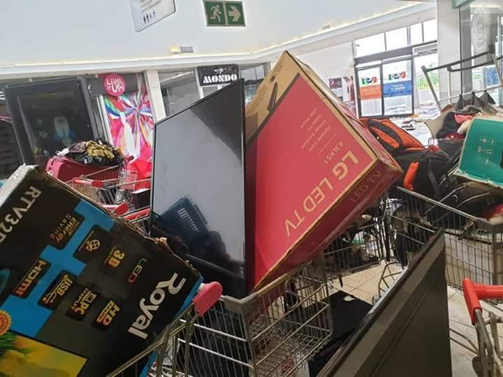 Shoprite Looters paraded, stolen goods recovered.