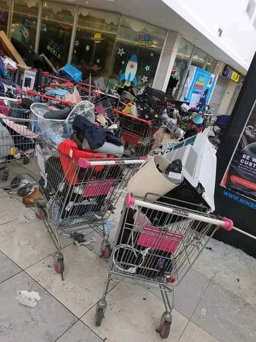 Shoprite Looters paraded, stolen goods recovered.