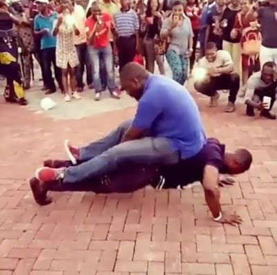 #BBNaija: Kemen Challenged To Do 20 Push Ups While Carrying Man Weighing 114kg (Video)