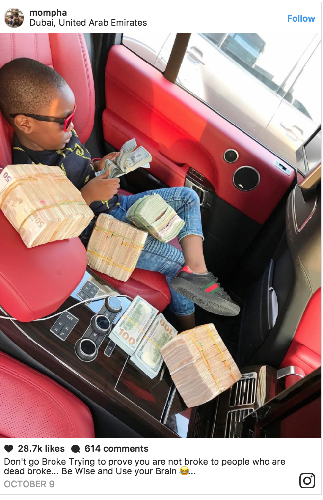Son of Nigerian Millionaire and Hushpuppi Best-Friend Mompha Flaunts Bundles of Foreign Currencies (Photos)
