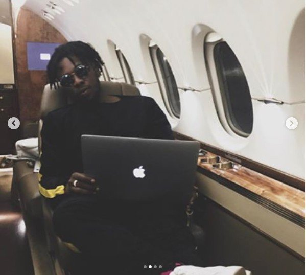 Runtown Shows Off Bundles Of Dollars On A Private Jet! (Photos)