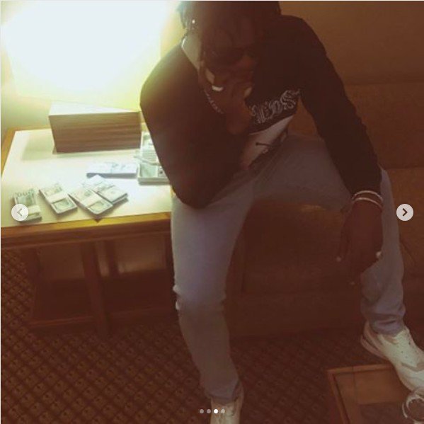 Runtown Shows Off Bundles Of Dollars On A Private Jet! (Photos)