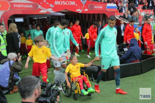 Cristiano Ronaldo Wins Hearts Of Fans Again As He Walks With Disabled Girl Into Football Pitch ( Photos )