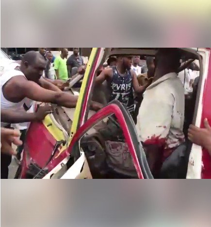 Photos Of Ghastly Motor Accident In Benin City After Two Buses Collided