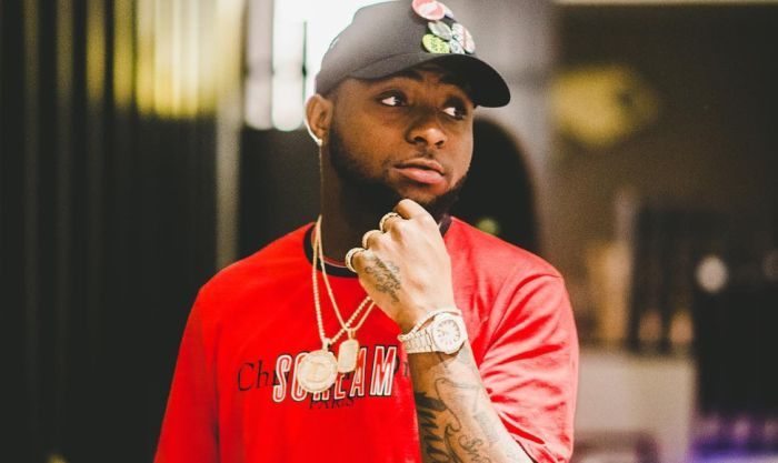 Baddest! See As Davido's 1-Year-Old Daughter Plays With Dollar Notes