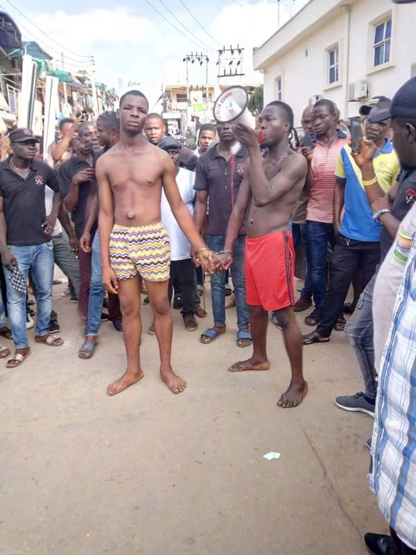 Phone Thieves Caught, Handcuffed & Made To Sing Publicly In Anambra (Photo)