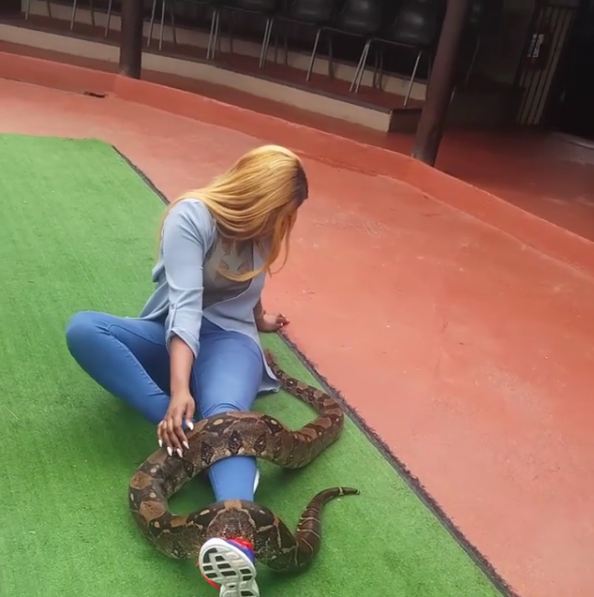 See What A Python Is Doing To Actress Rukky Sanda In South Africa (Photos + Video)