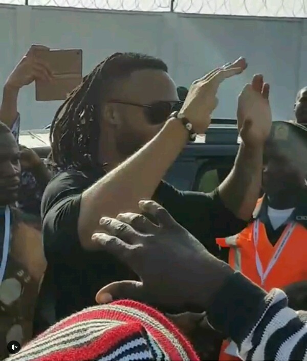 See How Flavour Was Welcomed By His Enugu Brothers As He Arrives Liberia For A Show (Photos + Video)