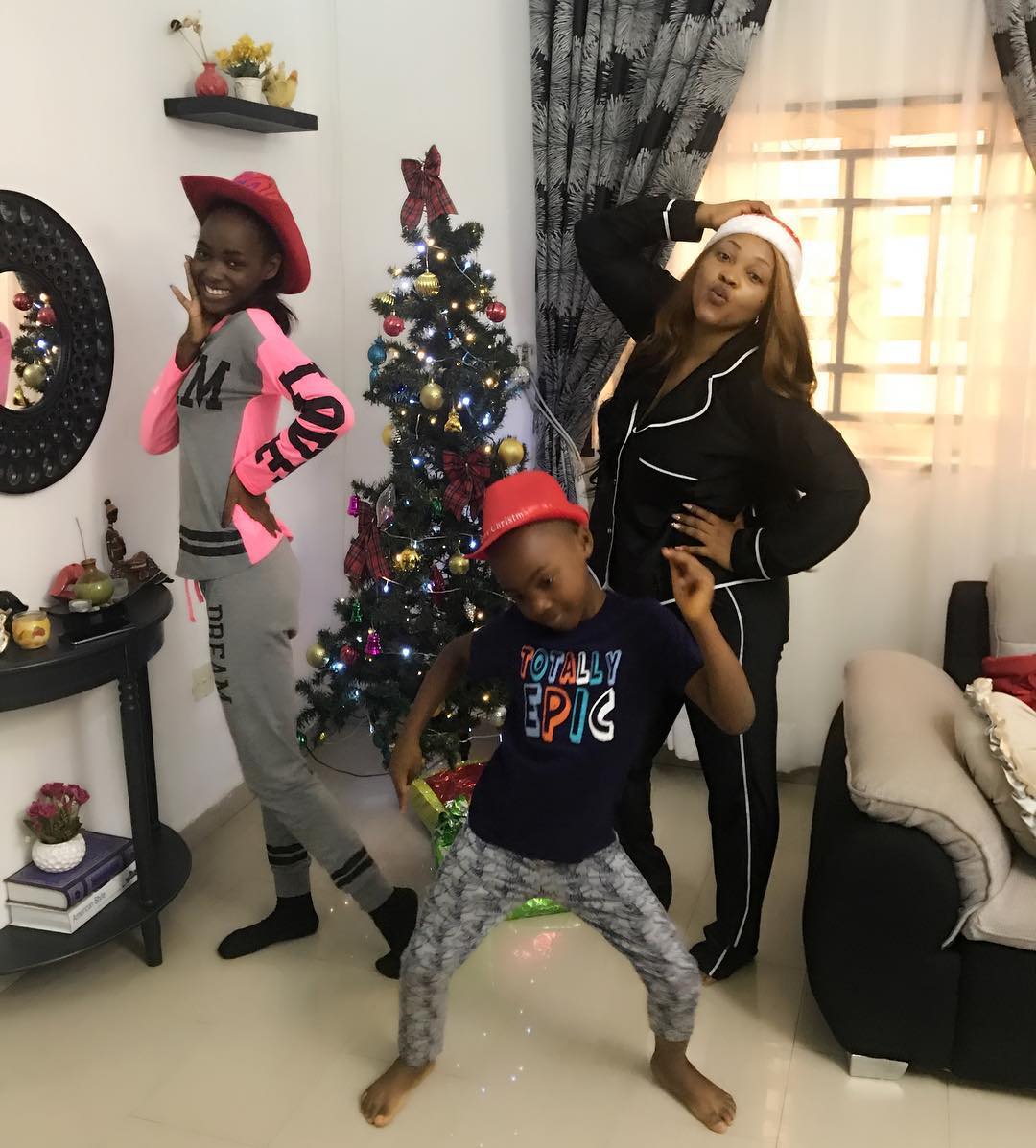 Photos Of Actress Mercy Aigbe And Her Children Celebrating Christmas At Home