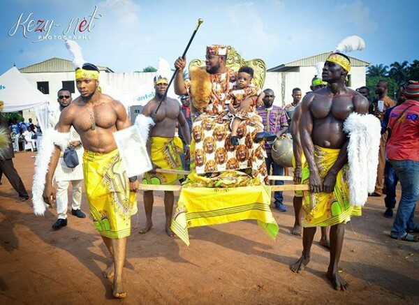 Couple Arrive Their Traditional Wedding In Wooden Platforms Carried By Muscular Guys