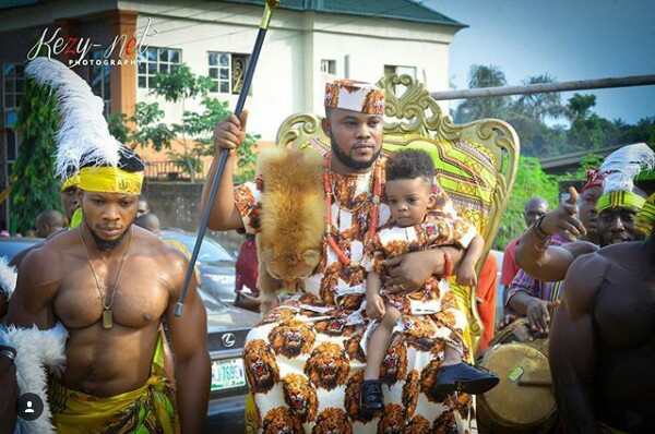 Couple Arrive Their Traditional Wedding In Wooden Platforms Carried By Muscular Guys