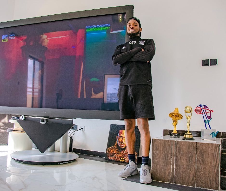 D'banj Shows Off His Big Screen TV And Awards (Pictures)